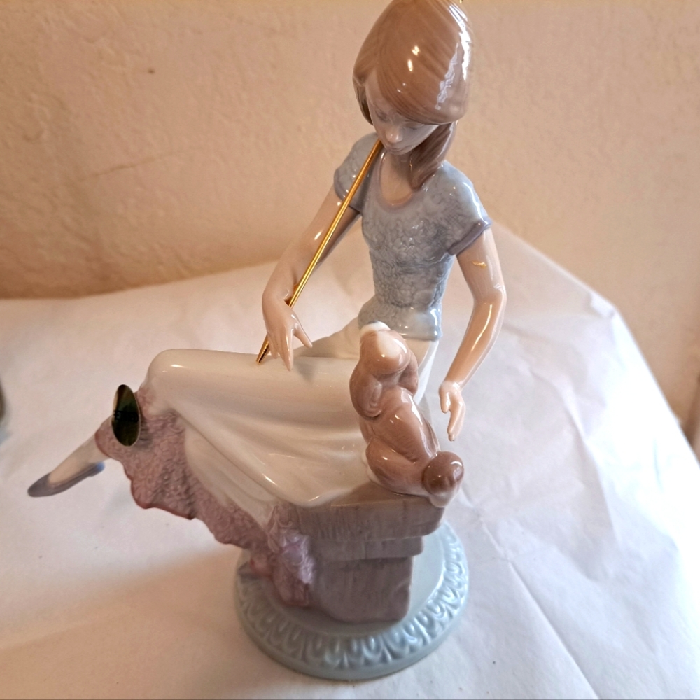 Lladro 1991 Picture Perfect girl with dog figurine in original box.